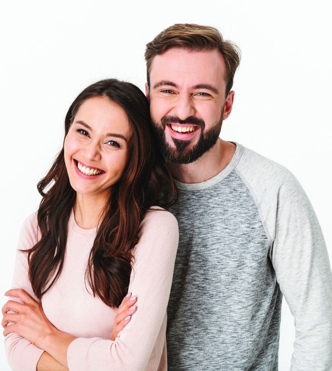 Smiling couple protecting their smiles after orthodontic treatment — Smile Club members at Highfield Dental & Facial Clinic, Southampton